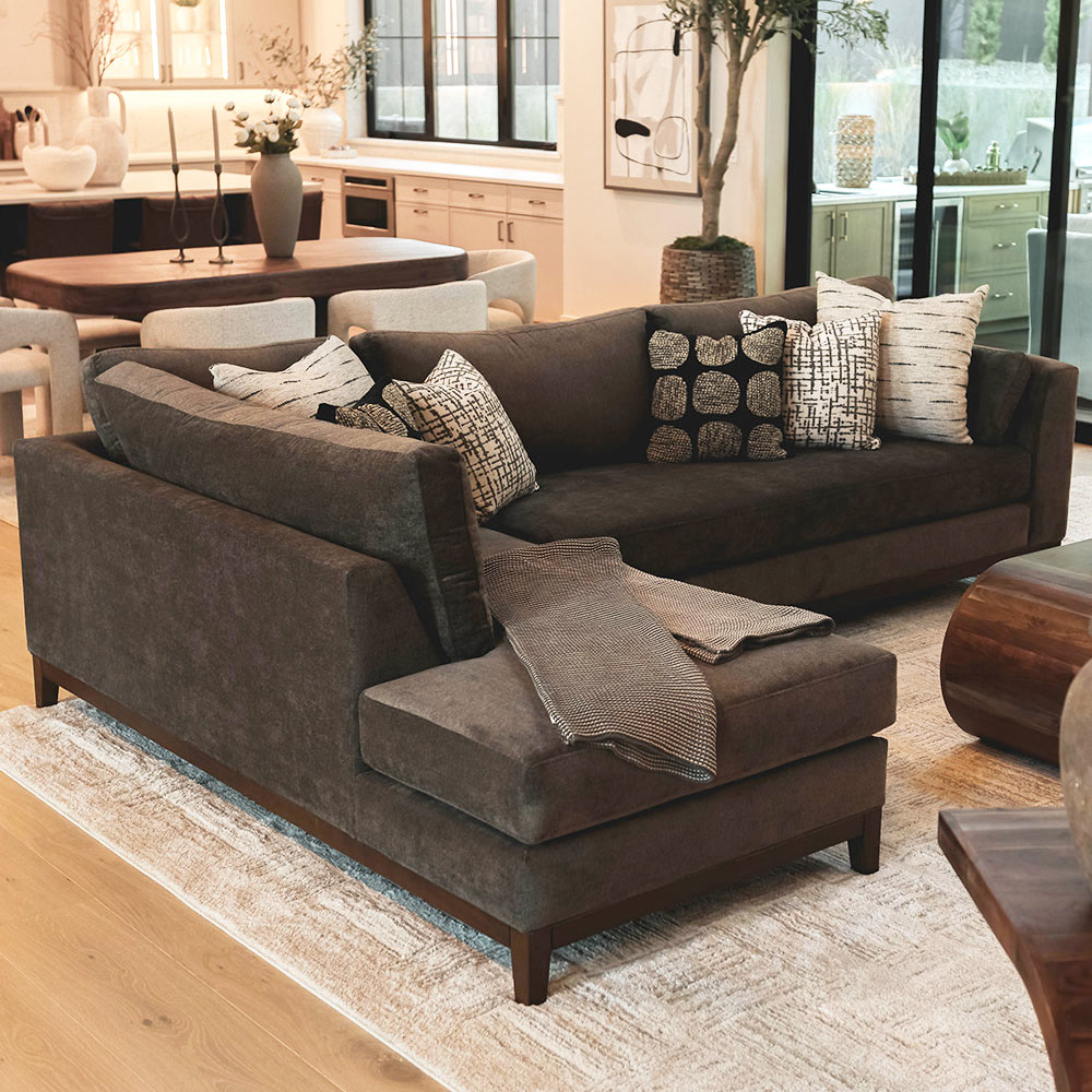 Sectional couch in java color in staged home