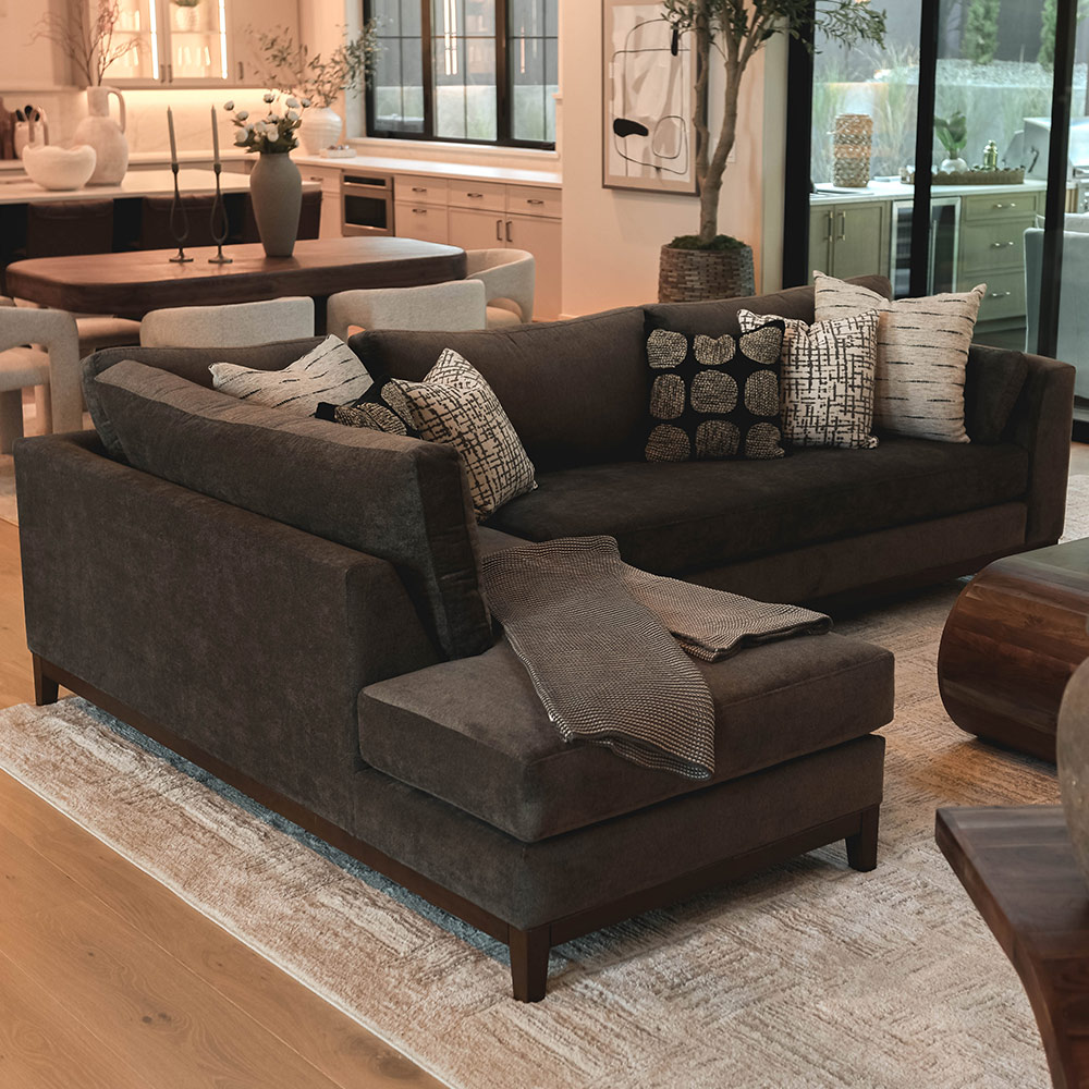 Sectional couch in java color in staged home
